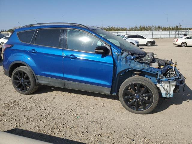 1FMCU9J92JUD24480 - 2018 FORD ESCAPE TITANIUM BLUE photo 4