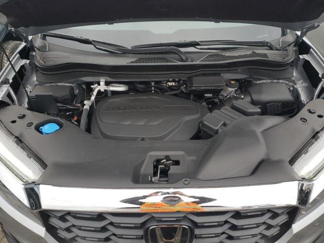 5FNYF8H56PB036044 - 2023 HONDA PASSPORT EXL SILVER photo 12