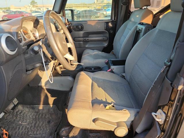 1J8FA54158L589606 - 2008 JEEP WRANGLER SAHARA შავი ფოტო 7