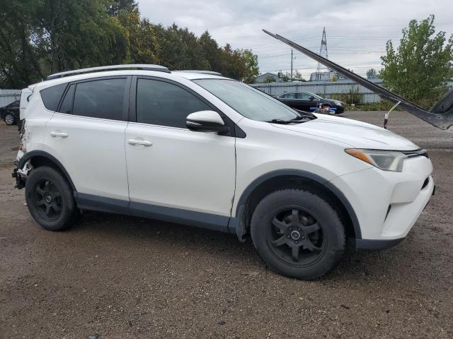 2T3BFREV2HW654666 - 2017 TOYOTA RAV4 LE WHITE photo 4