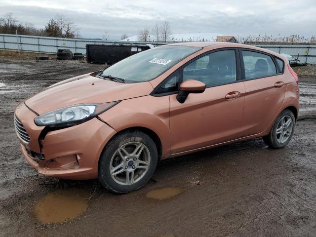 3FADP4EJ4HM110148 - 2017 FORD FIESTA SE ORANGE photo 1