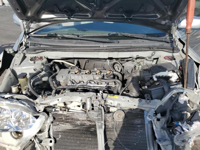 1NXBR32E63Z034672 - 2003 TOYOTA COROLLA CE GREEN photo 11