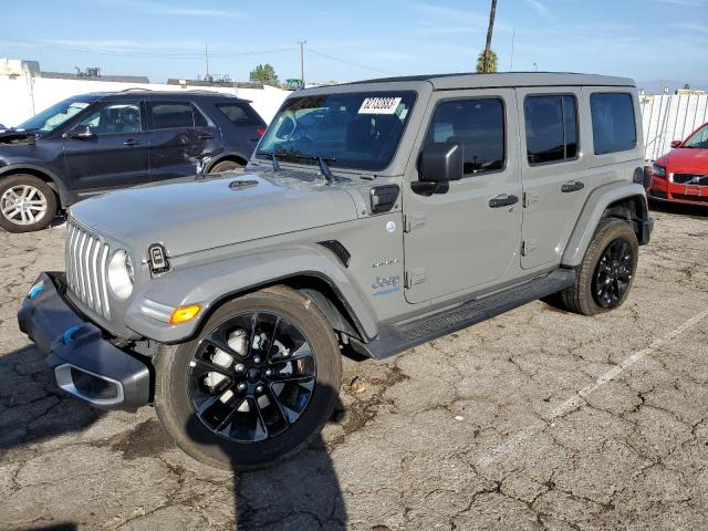 1C4JJXP65NW276487 - 2022 JEEP WRANGLER U SAHARA 4XE GRAY photo 1