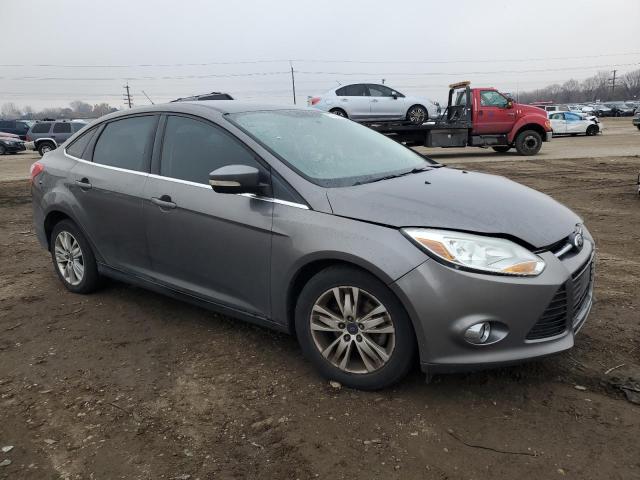 1FAHP3H23CL417420 - 2012 FORD FOCUS SEL GRAY photo 4