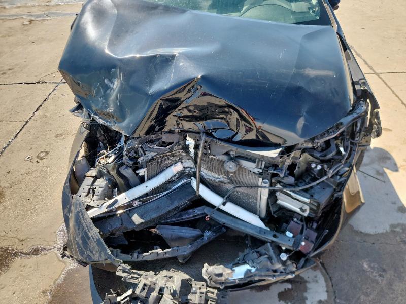 5YFB4MDE0PP004561 - 2023 TOYOTA COROLLA LE შავი ფოტო 11