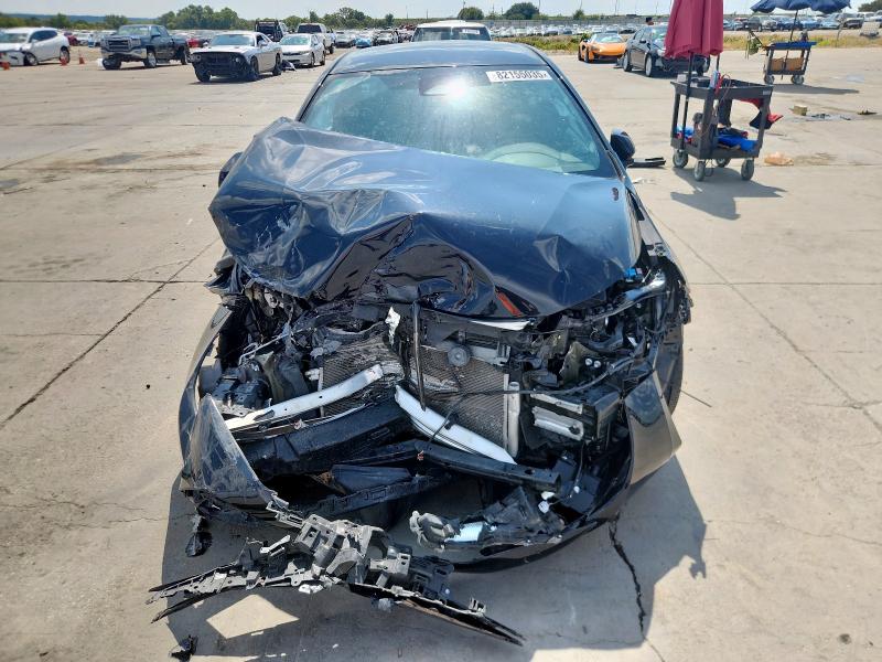 5YFB4MDE0PP004561 - 2023 TOYOTA COROLLA LE შავი ფოტო 5