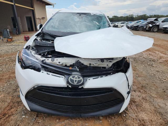 5YFBURHE6KP861838 - 2019 TOYOTA COROLLA L თეთრი ფოტო 5