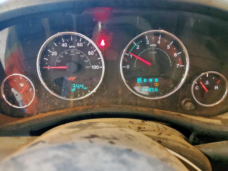 1C4BJWEG0EL111071 - 2014 JEEP WRANGLER U SAHARA TAN photo 9