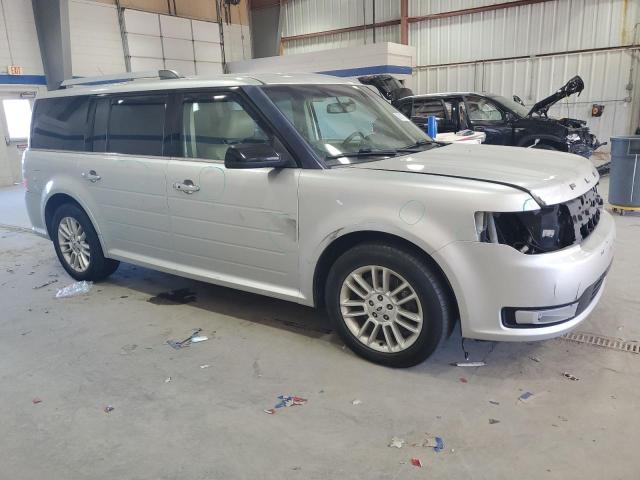 2FMHK6C88JBA14158 - 2018 FORD FLEX SEL SILVER photo 4