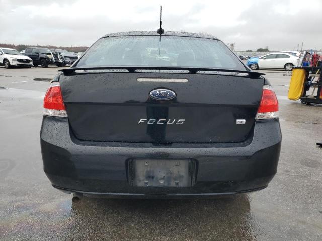 1FAHP3FN7AW298568 - 2010 FORD FOCUS SE BLACK photo 6