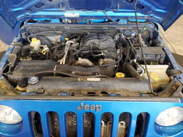 1C4BJWKG2FL630922 - 2015 JEEP WRANGLER U SPORT Blau Foto 12