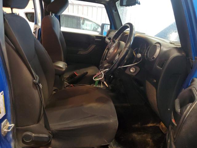 1C4BJWKG2FL630922 - 2015 JEEP WRANGLER U SPORT Blau Foto 7