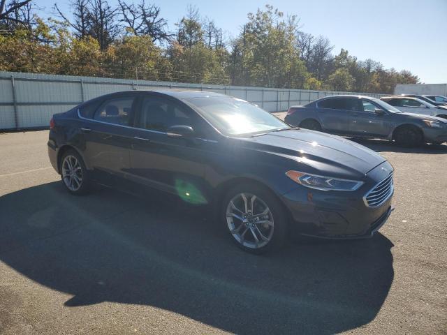 3FA6P0CD6LR142271 - 2020 FORD FUSION SEL შავი ფოტო 4