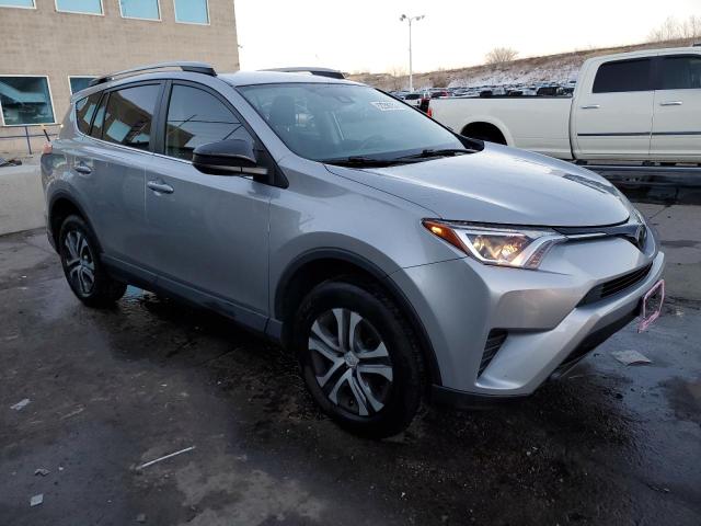 2T3BFREV7HW600392 - 2017 TOYOTA RAV4 LE SILVER photo 4