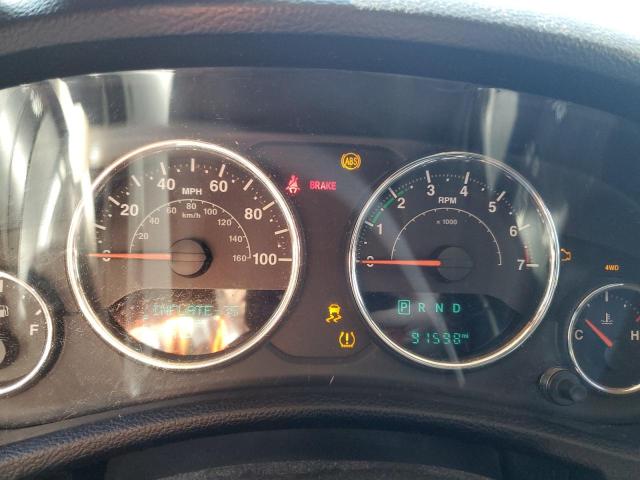 1C4HJWEG4EL306732 - 2014 JEEP WRANGLER U SAHARA BLACK photo 9