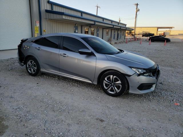 2HGFC2F59JH569332 - 2018 HONDA CIVIC LX SILVER photo 4