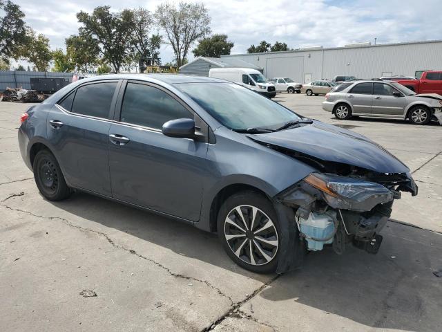 2T1BURHE0JC991418 - 2018 TOYOTA COROLLA L BLUE photo 4