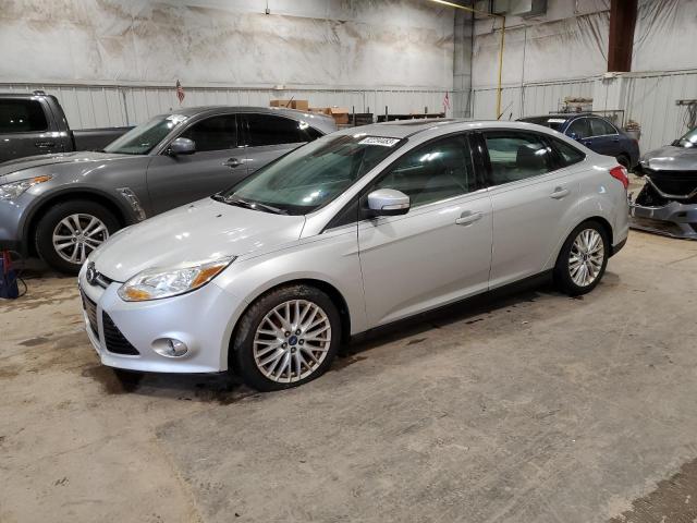 1FAHP3H25CL357043 - 2012 FORD FOCUS SEL SILVER photo 1