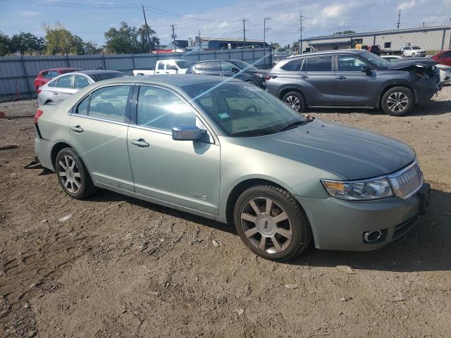 3LNHM28T09R611897 - 2009 LINCOLN MKZ GREEN photo 4