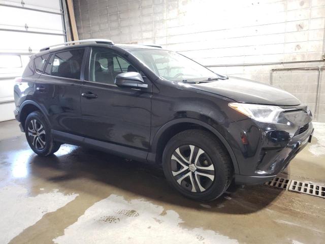 2T3BFREV2GW490673 - 2016 TOYOTA RAV4 LE 黑色 照片 4