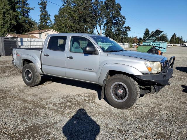 5TFLU4EN4BX001529 - 2011 TOYOTA TACOMA DOUBLE CAB SILVER photo 4