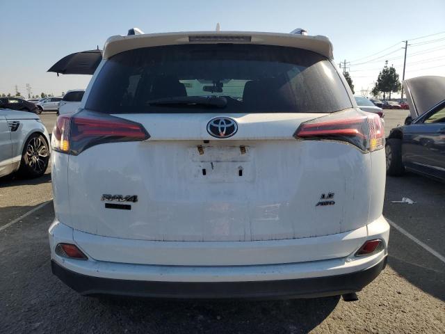 2T3BFREV9GW533325 - 2016 TOYOTA RAV4 LE WHITE photo 6