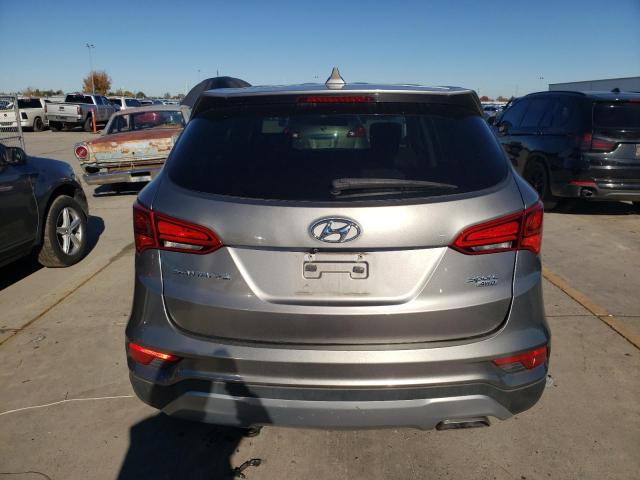 5NMZTDLB3HH011413 - 2017 HYUNDAI SANTA FE S GRAY photo 6