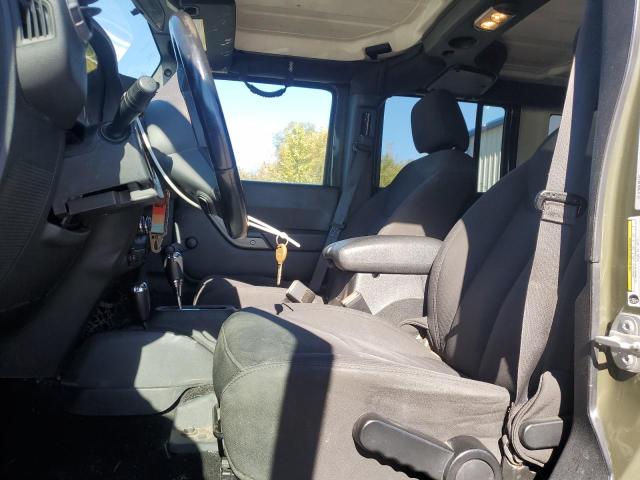 1C4BJWDG0GL102231 - 2016 JEEP WRANGLER U SPORT GREEN photo 7