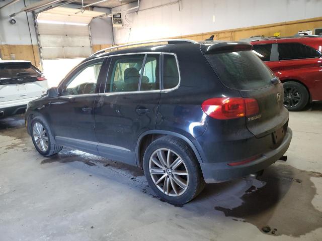 WVGBV7AX8CW523102 - 2012 VOLKSWAGEN TIGUAN S შავი ფოტო 2