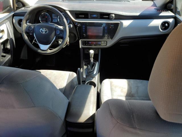 5YFBURHE8HP700285 - 2017 TOYOTA COROLLA L RED photo 8