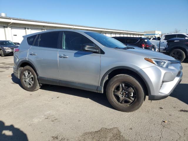 2T3ZFREV3JW522682 - 2018 TOYOTA RAV4 LE SILVER photo 4