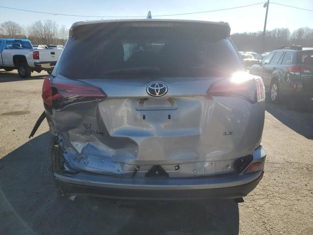 2T3ZFREV3JW522682 - 2018 TOYOTA RAV4 LE SILVER photo 6