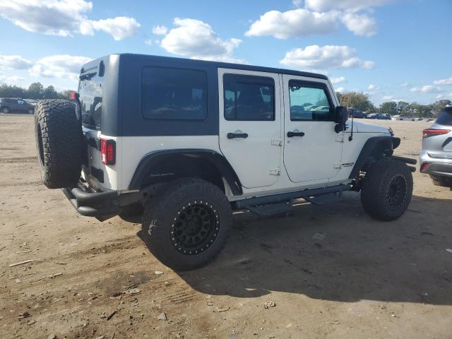 1J4BA3H13AL174319 - 2010 JEEP WRANGLER U SPORT WHITE photo 3