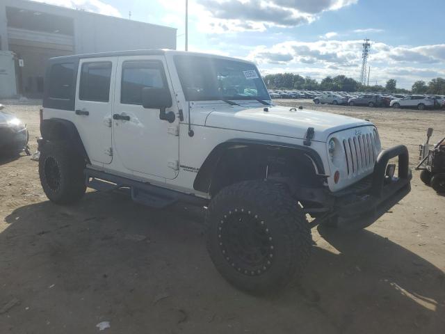 1J4BA3H13AL174319 - 2010 JEEP WRANGLER U SPORT WHITE photo 4