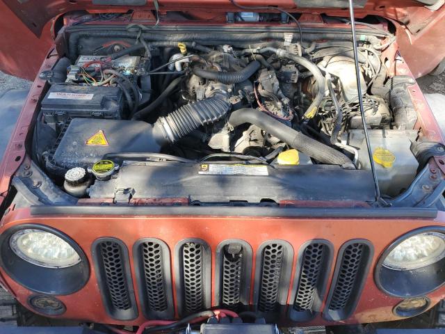 1J4FA54189L704816 - 2009 JEEP WRANGLER SAHARA Turuncu fotoğraf 12