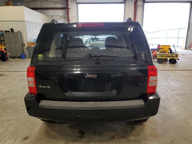 1J4NF2GBXAD611438 - 2010 JEEP PATRIOT SPORT BLACK photo 6