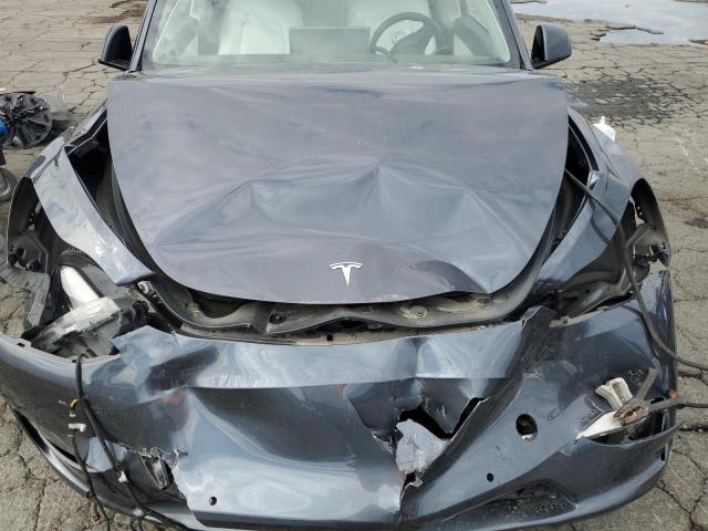 7SAYGAEEXNF402192 - 2022 TESLA MODEL Y Graphit Foto 12