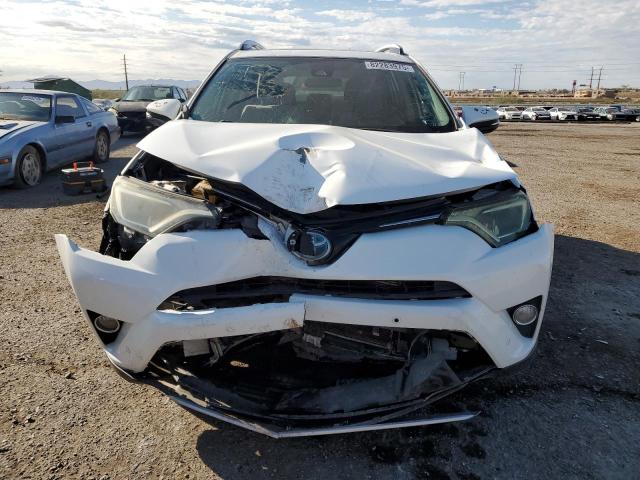 JTMRJREVXHD116341 - 2017 TOYOTA RAV4 HV LE Biały zdjęcie 5
