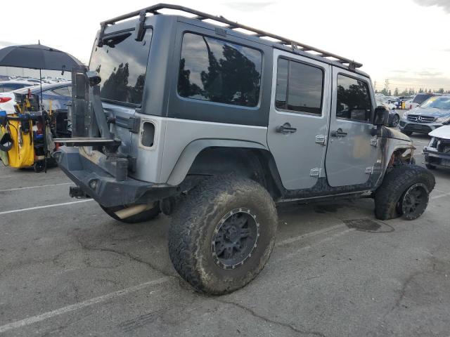 1C4BJWDG7GL110066 - 2016 JEEP WRANGLER UNLIMITED SPORT GRAY photo 3