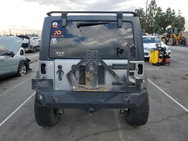 1C4BJWDG7GL110066 - 2016 JEEP WRANGLER UNLIMITED SPORT GRAY photo 6