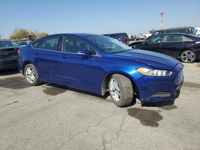 3FA6P0H73FR114547 - 2015 FORD FUSION SE BLUE photo 4