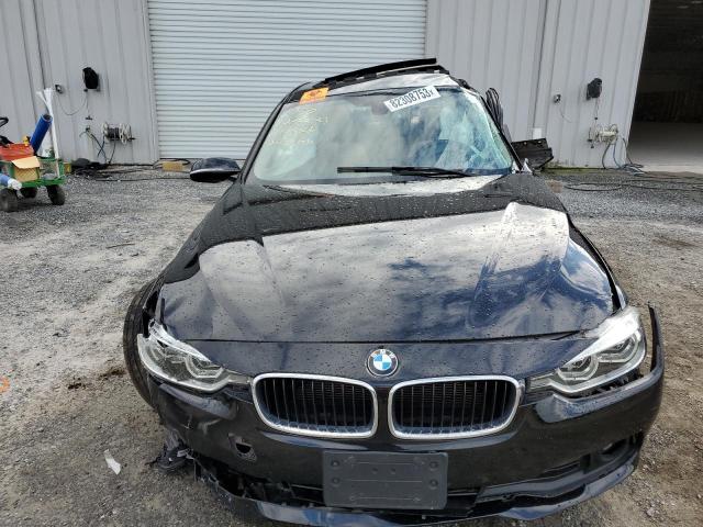 WBA8A3C57JA505566 - 2018 BMW 320 XI BLACK photo 5