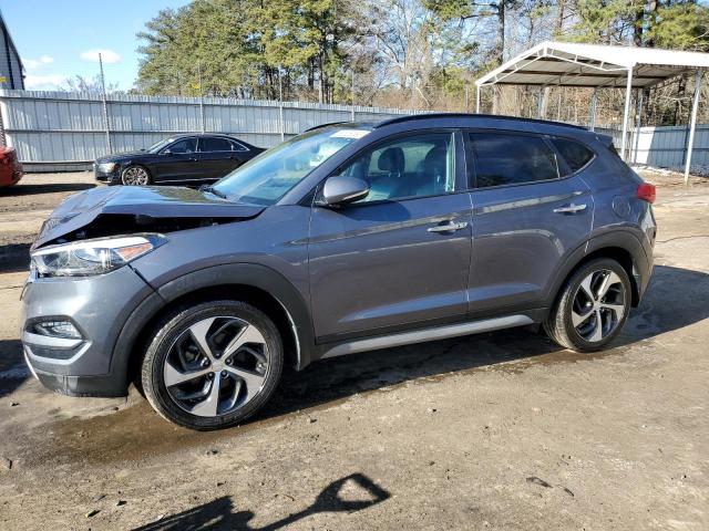 KM8J33A29JU828583 - 2018 HYUNDAI TUCSON VALUE GRAY photo 1