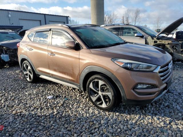 KM8J33A29HU344004 - 2017 HYUNDAI TUCSON LIMITED BROWN photo 4