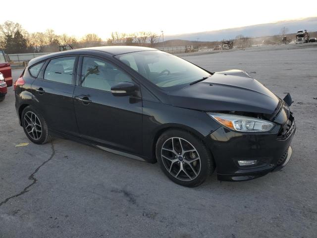 1FADP3K21FL215140 - 2015 FORD FOCUS SE BLACK photo 4