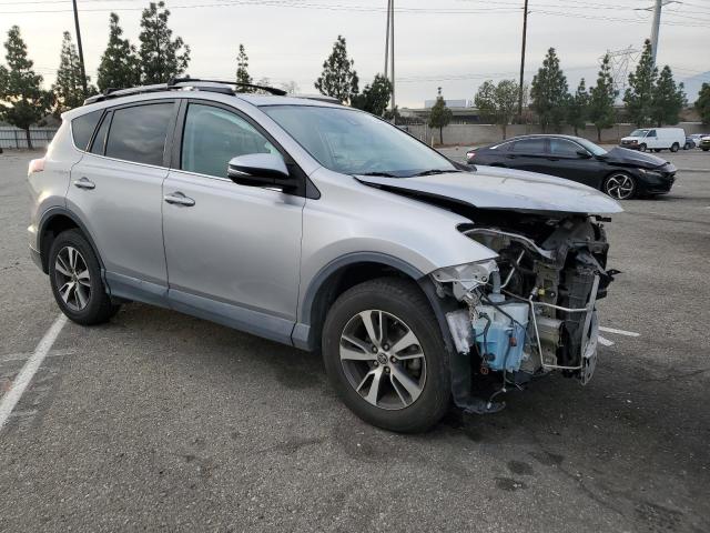 2T3WFREV7HW330145 - 2017 TOYOTA RAV4 XLE SILVER photo 4