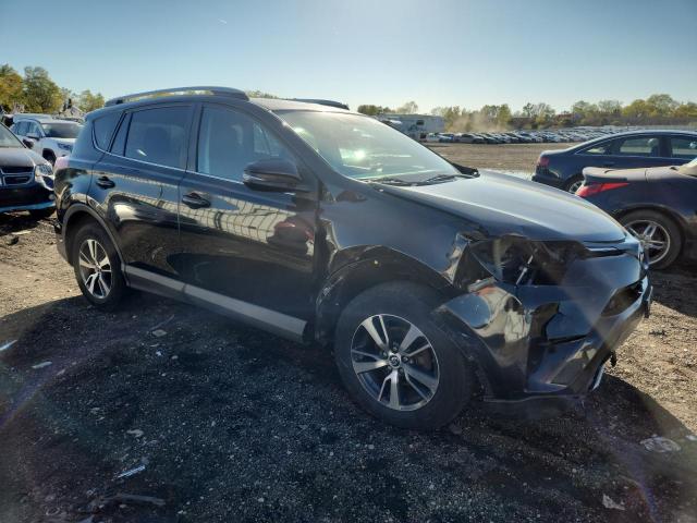 2T3RFREVXGW512336 - 2016 TOYOTA RAV4 XLE BLACK photo 4