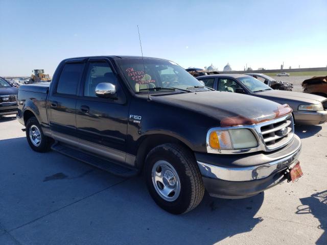 1FTRW076X2KD16206 - 2002 FORD F150 SUPERCREW BLACK photo 4