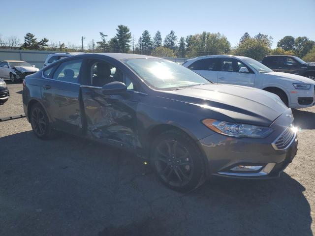 3FA6P0H7XJR275809 - 2018 FORD FUSION SE BLACK photo 4