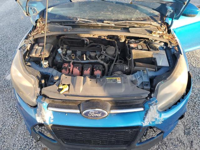 1FAHP3F25CL352220 - 2012 FORD FOCUS SE BLUE photo 11